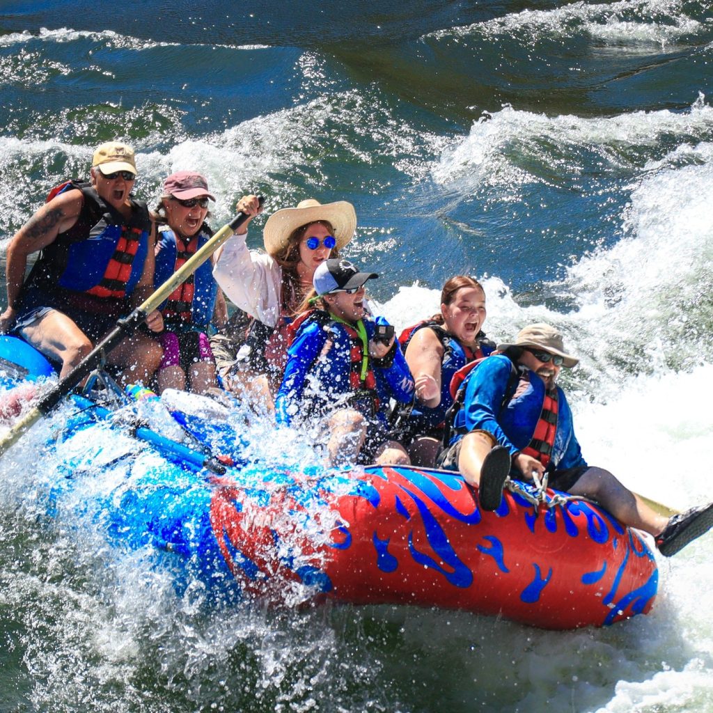 People white water rafting
