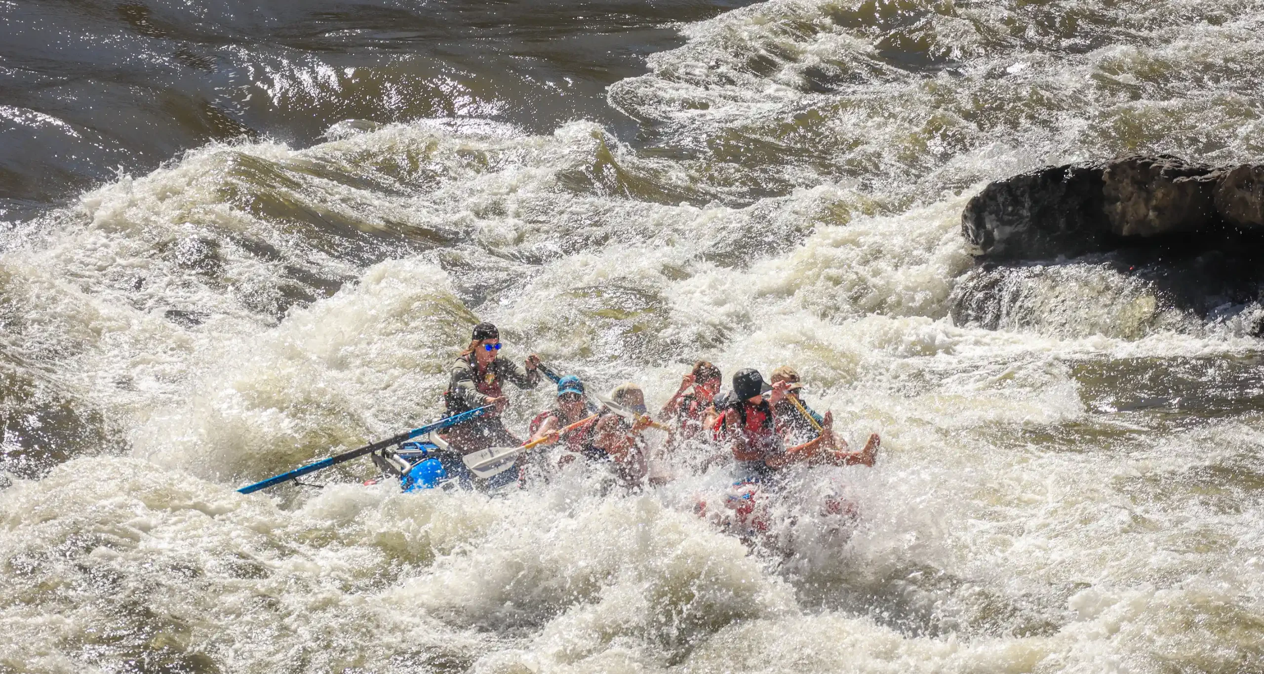 Rafting group going on a white water rafting adventure